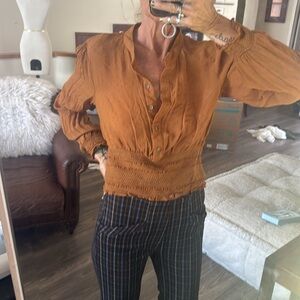 Free people rust colored size smocked waist and wrists buttons top medium
